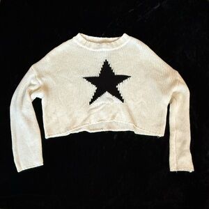 White and black knit star sweater